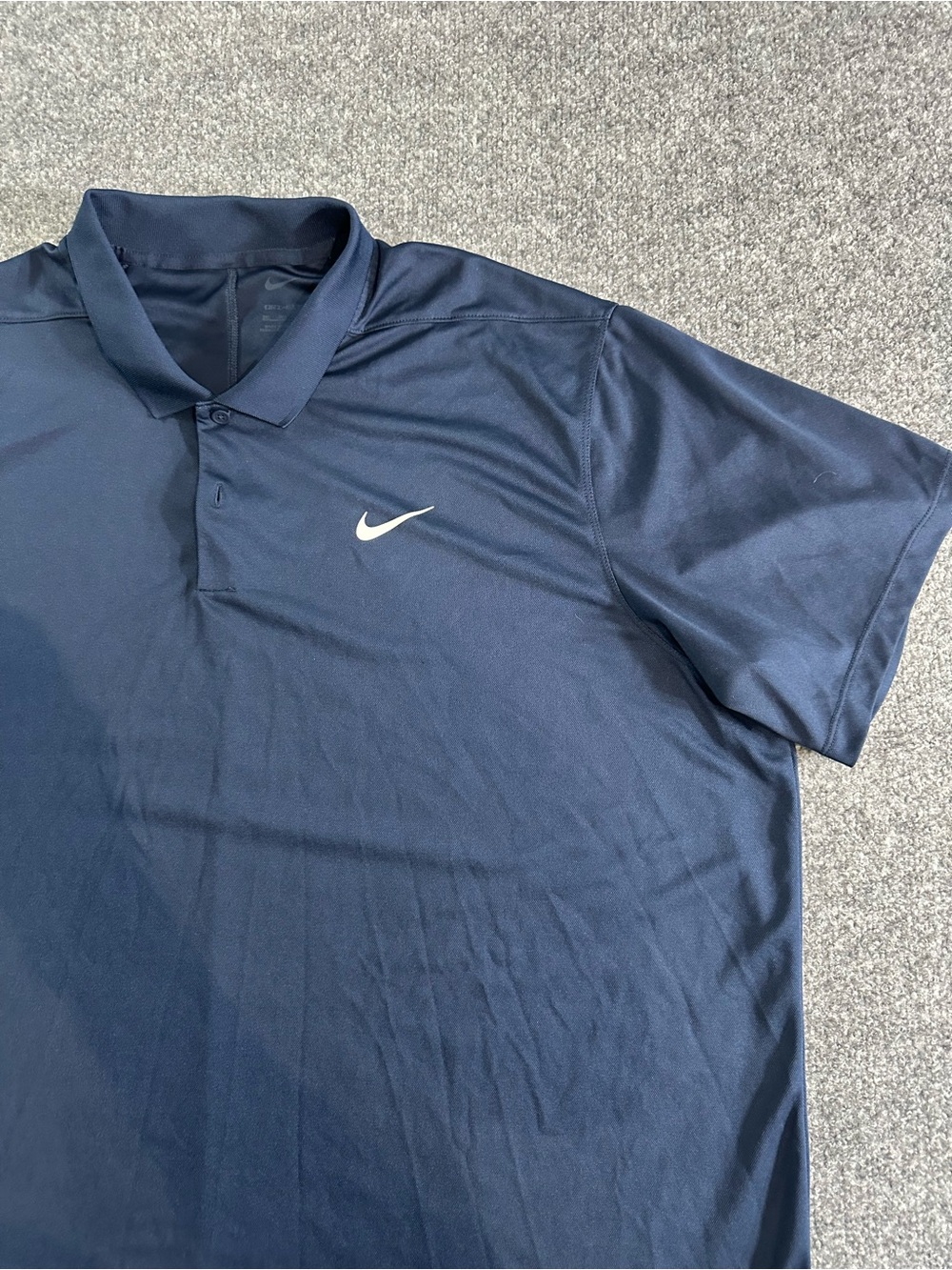 Nike Men's Navy Polo with White Swoosh